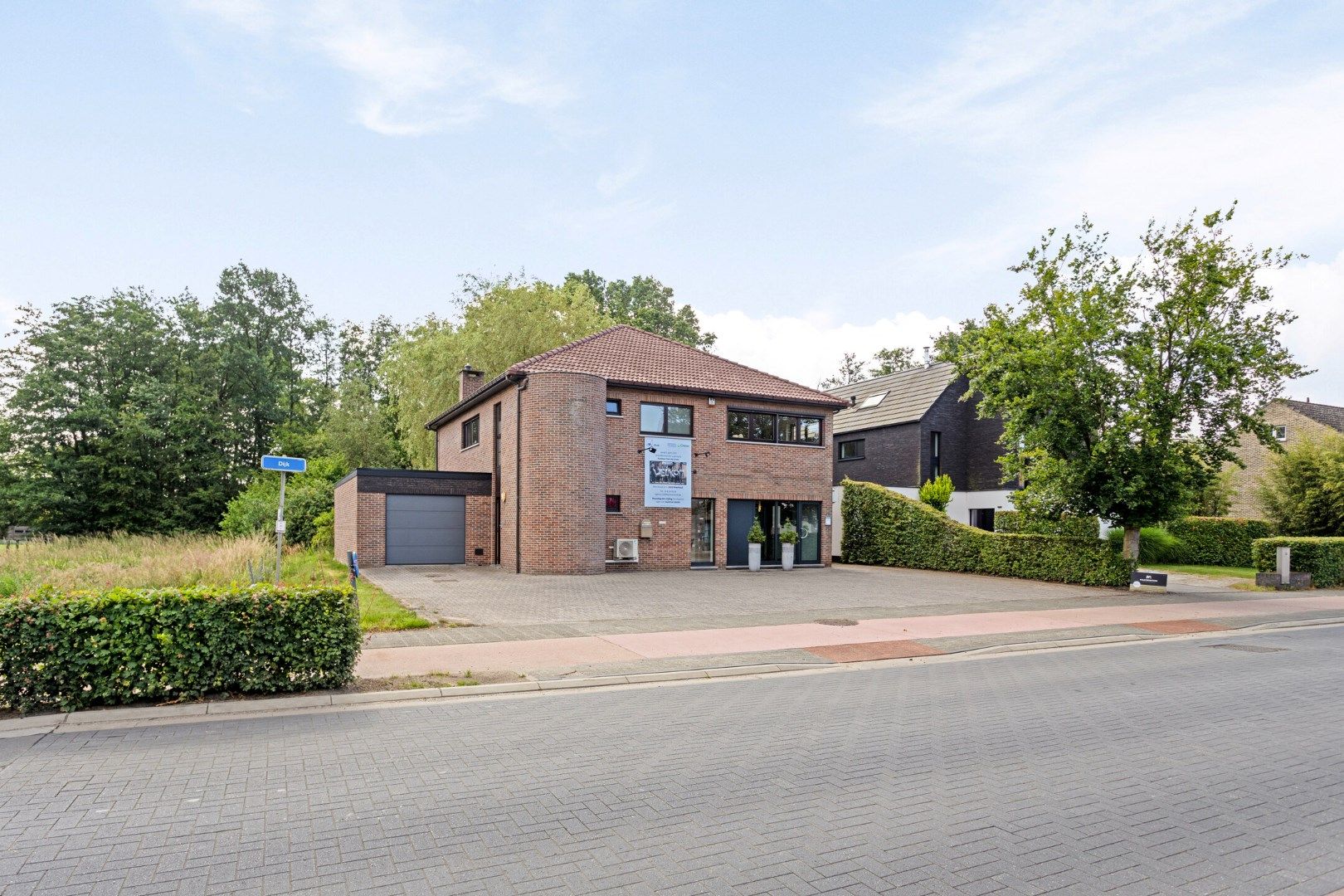 Uniek handelshuis met diverse mogelijkheden, voldoende parking en instapklaar appartement in Olmen !  foto 35