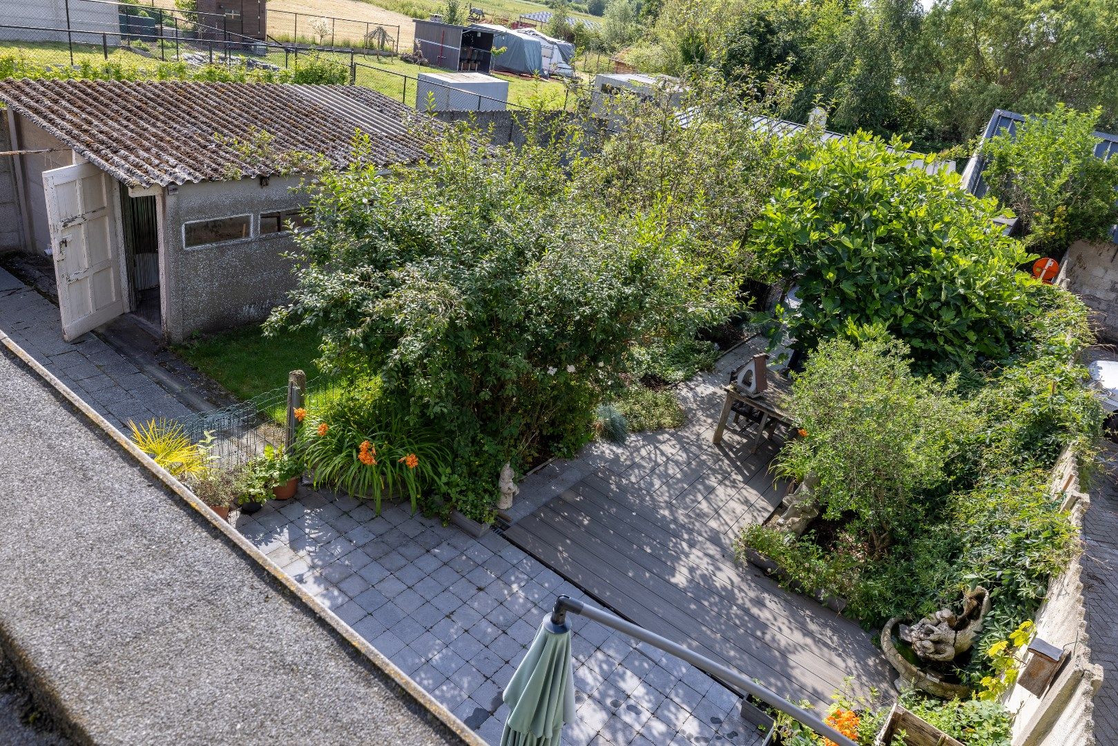 Uiterst gezellige woning met 3 slk, garage, terras en tuin foto 20