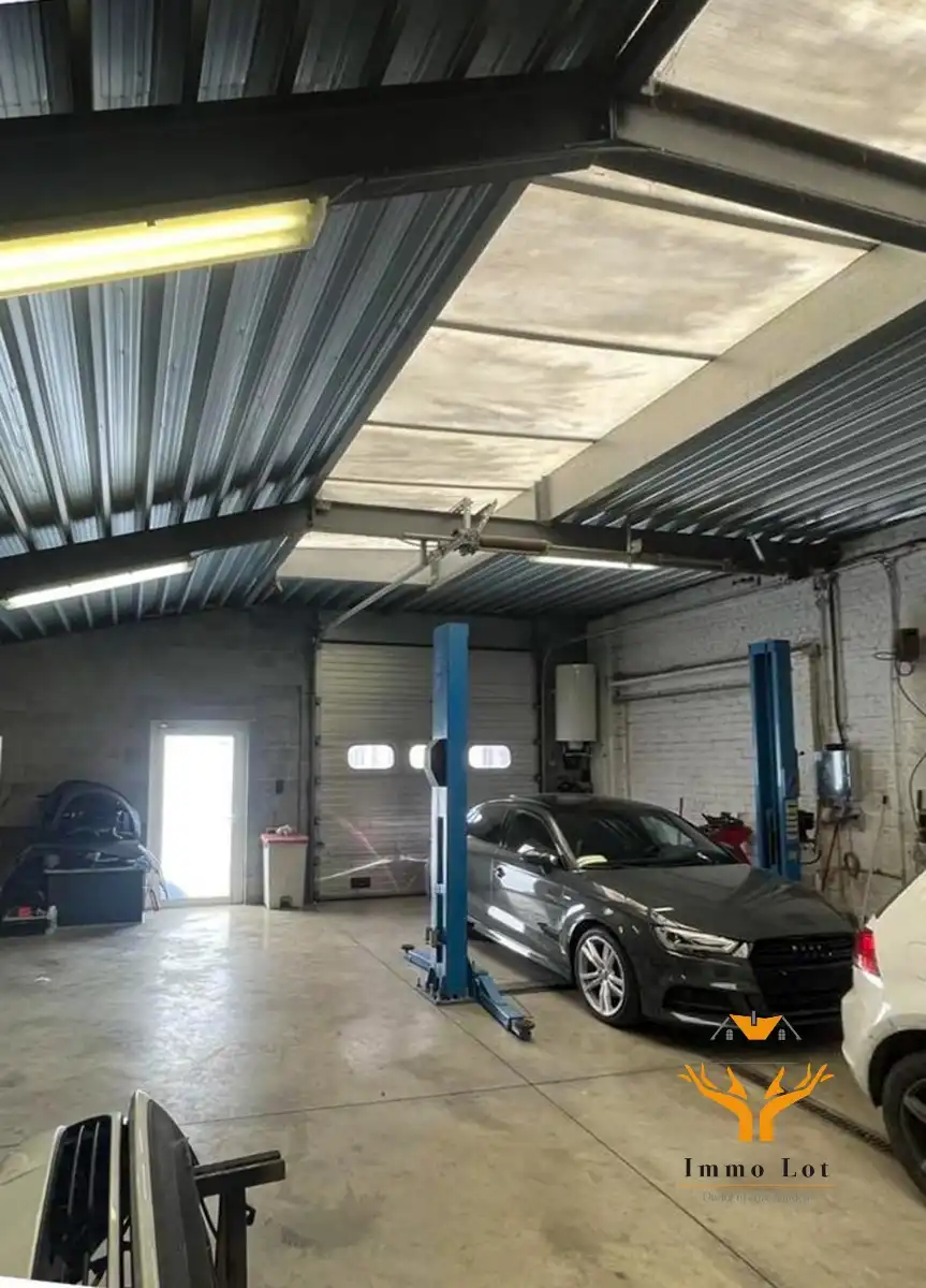 Woning met toonzaal, magazijn en garages te Hamme foto 8