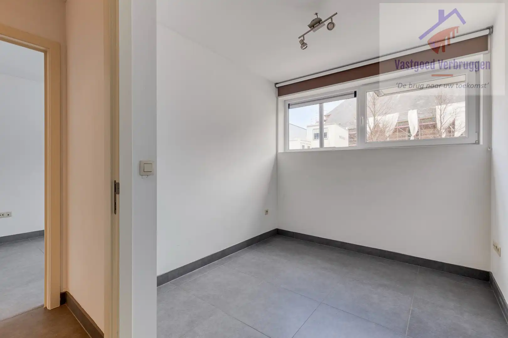 Modern recent gelijkvloers appartement met zuidgericht terras, zonnepanelen en garagebox in hartje Nieuwerkerken foto 8