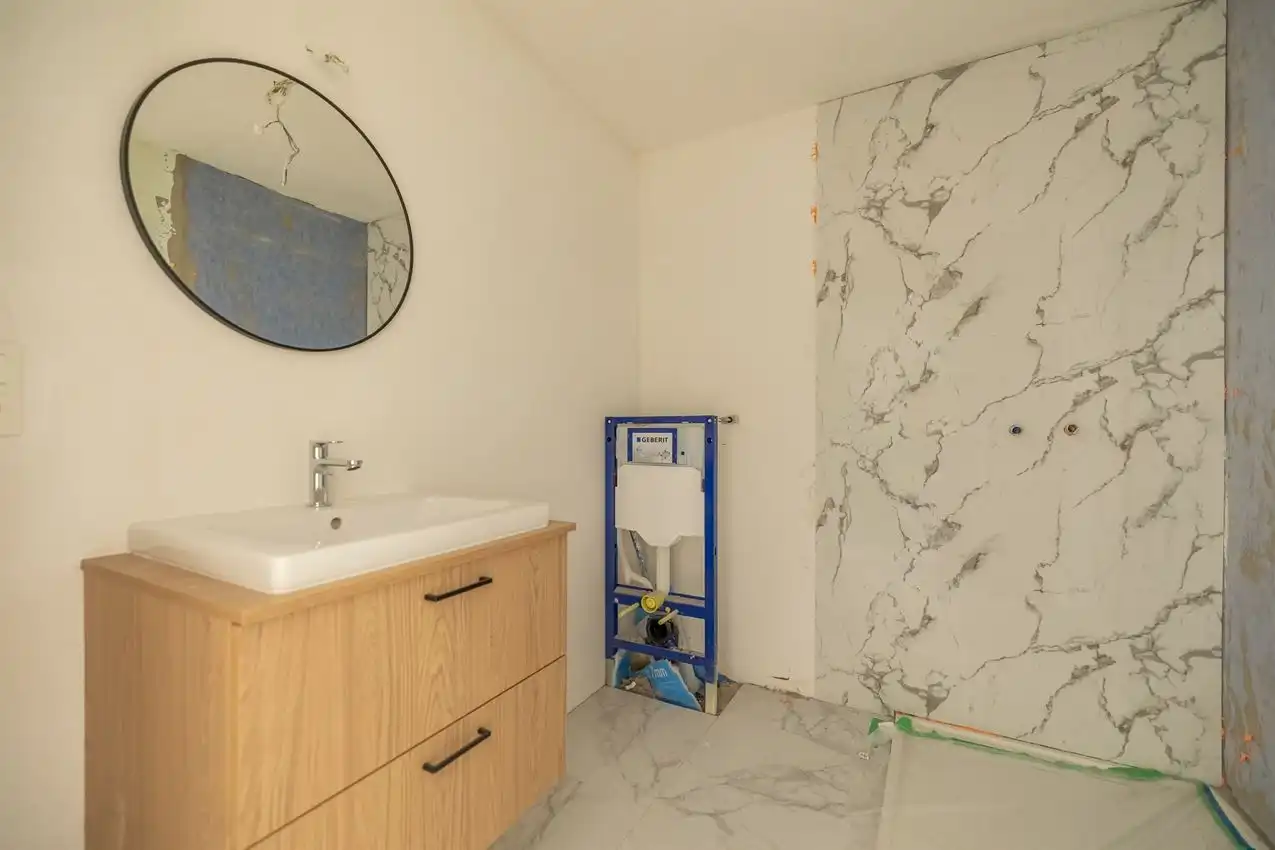 Gelijkvloers éénslaapkamer appartement met tuintje foto 8