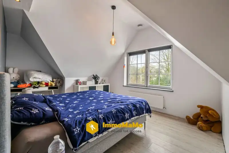 LANDELIJKE WONING MET ENORM RUIME TUIN TE KOOP IN WACHTEBEKE foto 5