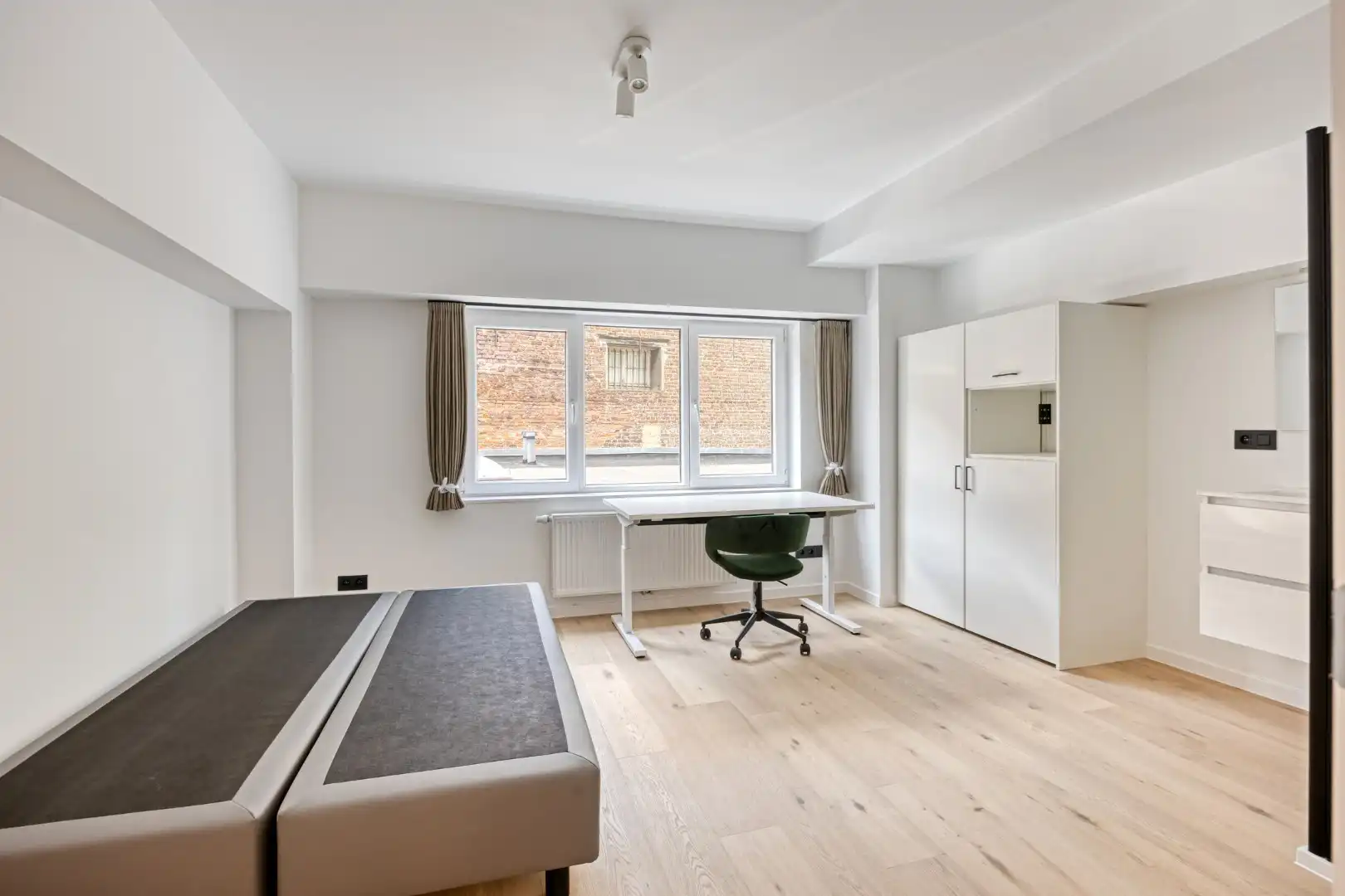 Volledig gerenoveerde studentenkamer in residentie met 29 studentenkamers in hartje Leuven - EPC label A! foto 5