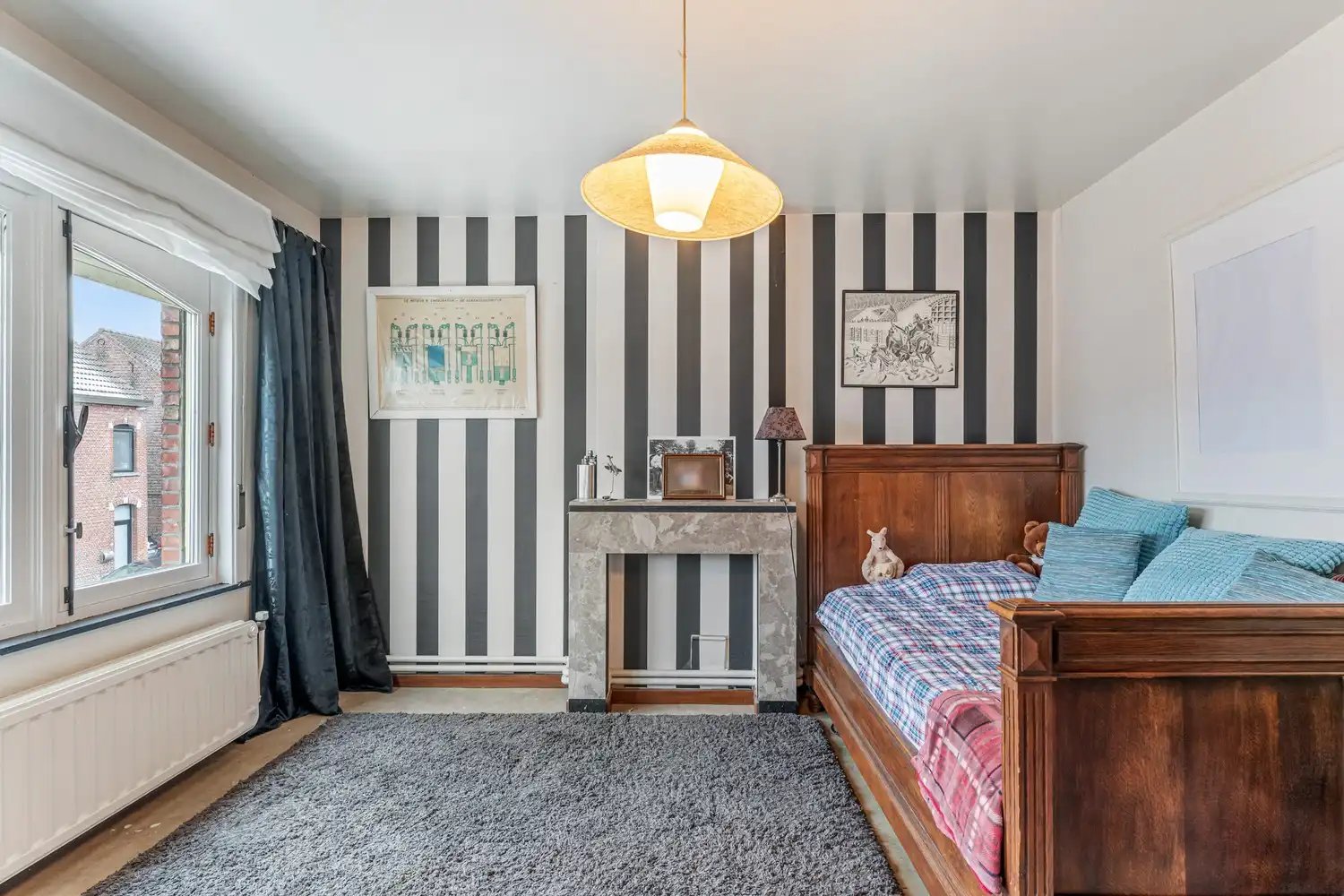 Goed gelegen en vrijstaande woning met 2 slaapkamers, uitbreidingsmogelijkheden onder het dak en een oprit met een garage op een perceel van 9a 96ca grenzend aan en met de tuin deels gelegen in agrarisch gebied! foto 15