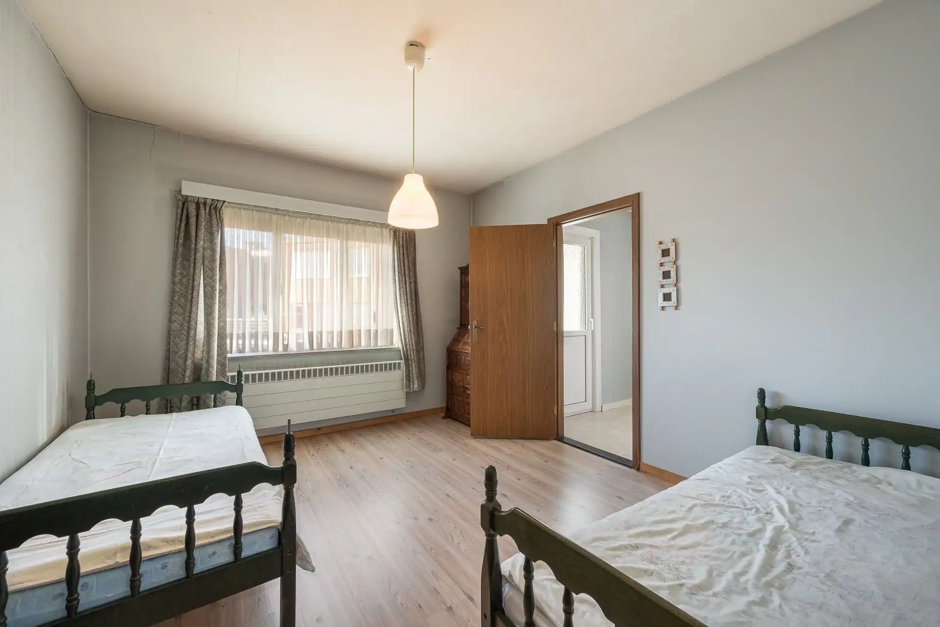 Halfopen bebouwing met potentieel in groene Bosheidelaan! foto 12