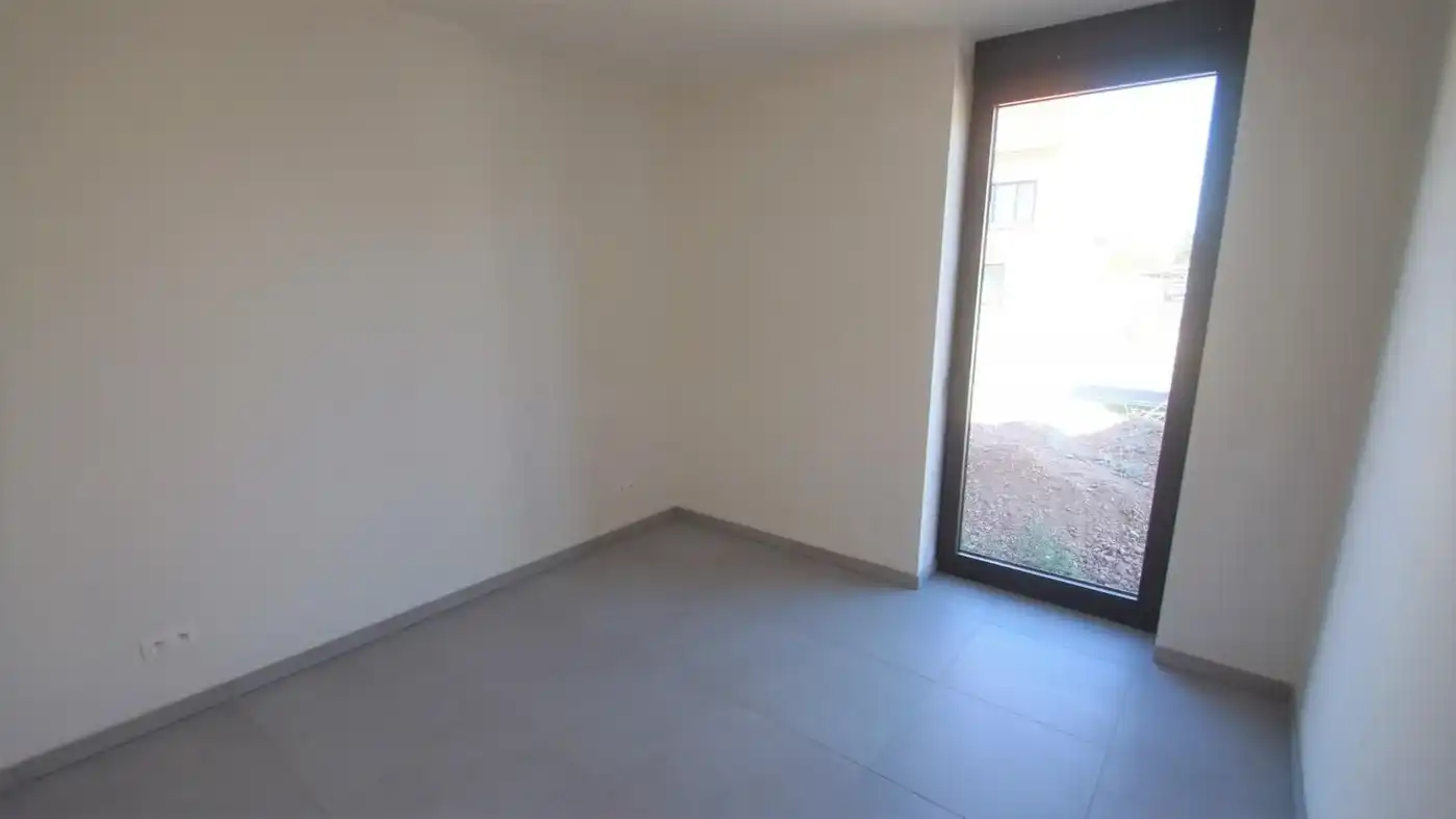 Nieuwbouwapp. met 2 slpks, autostaanplaats, ruim terras en tuintje foto 8