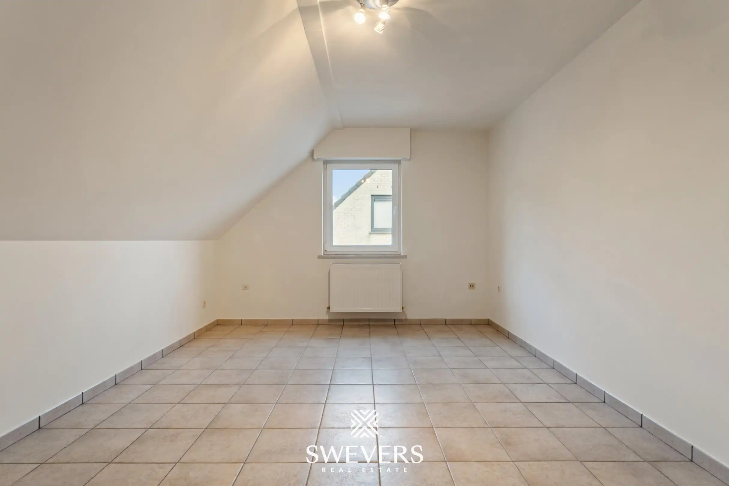 Ruim duplex appartement met 2 slaapkamers, terras en garage in Heusden-Zolder foto 9