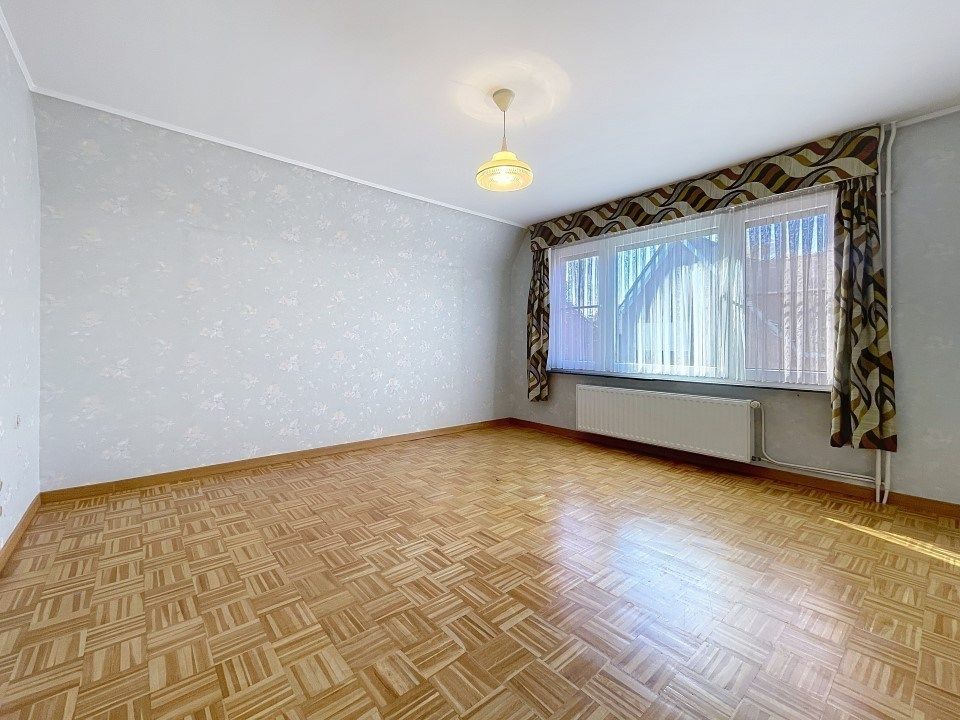 Karaktervolle alleenstaande woning met garage én tuin  foto 6