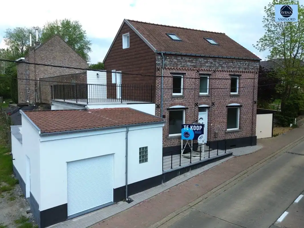 ZEER RUIME WONING MET 4 SLAAPKAMERS EN 2 GARAGES foto 23