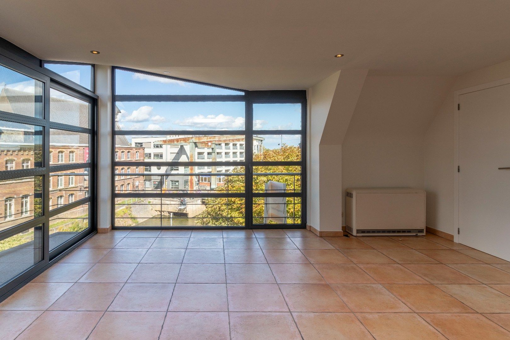 Duplex met 2 slpks en 2 badk in het centrum van Ninove foto 3