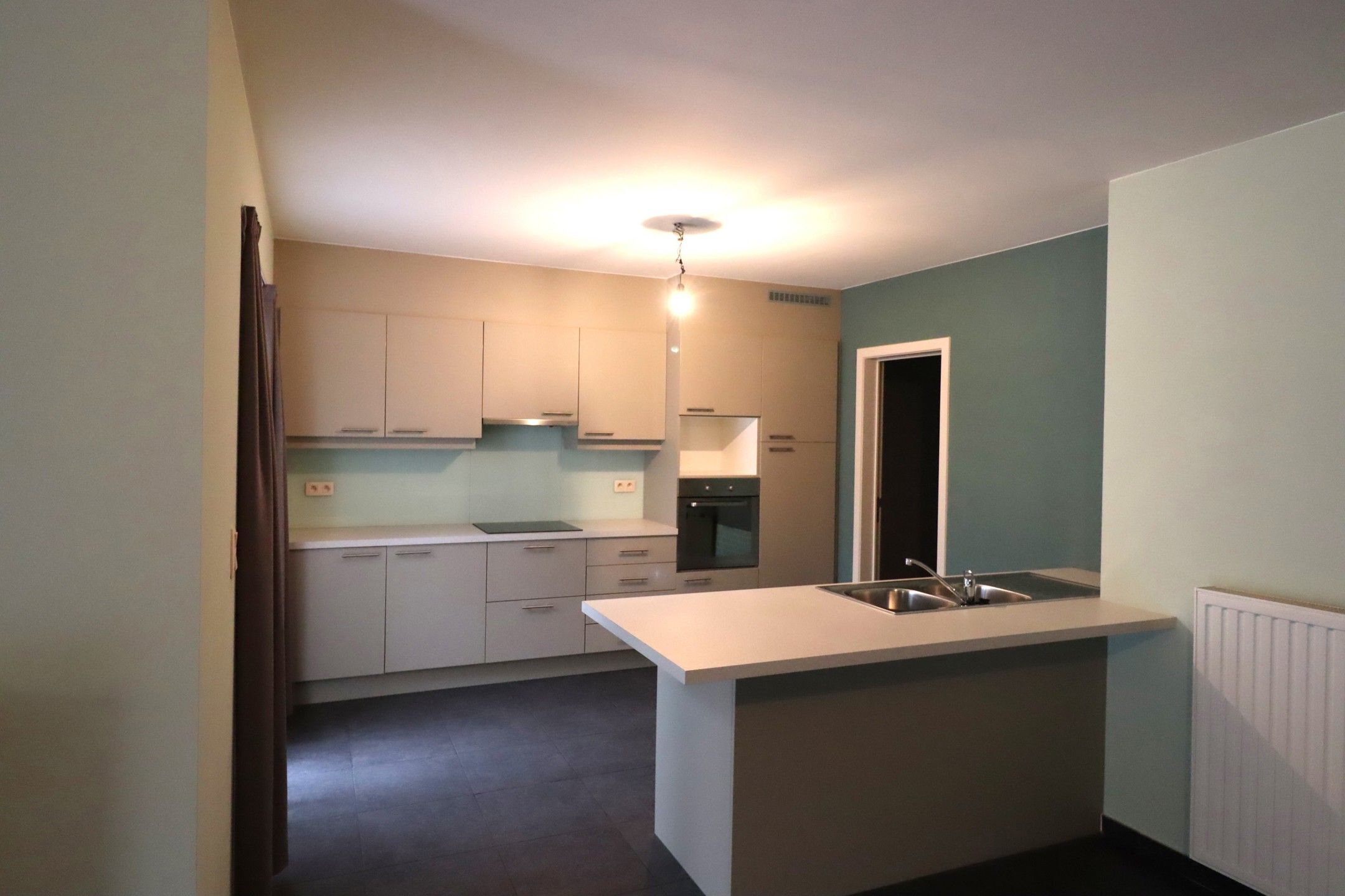 GLV appartement met tuin en ondergrondse parkeerplaats foto {{pictureIndex}}