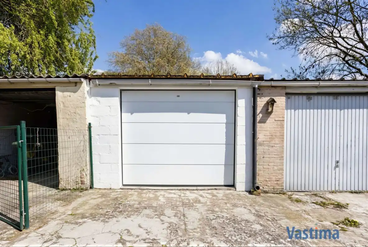 Energiezuinige en instapklare starterswoning met 2 slaapkamers in hartje Erembodegem foto 19