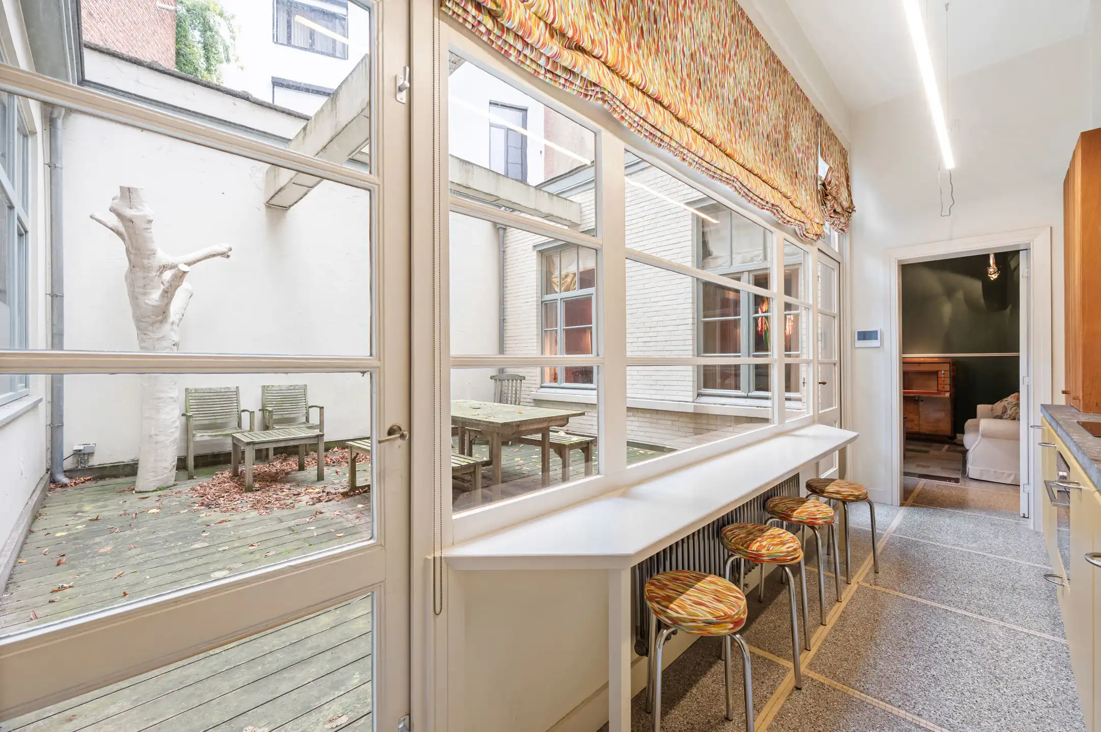 Uniek gelijkvloers appartement met privéwellness en terras foto 2