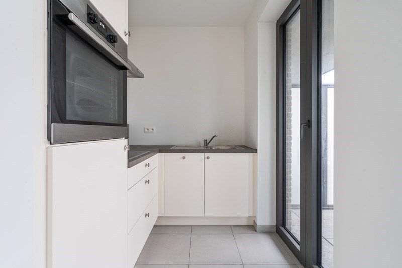 Energiezuinig nieuwbouwappartement met twee slaapkamers in Lokeren foto {{pictureIndex}}