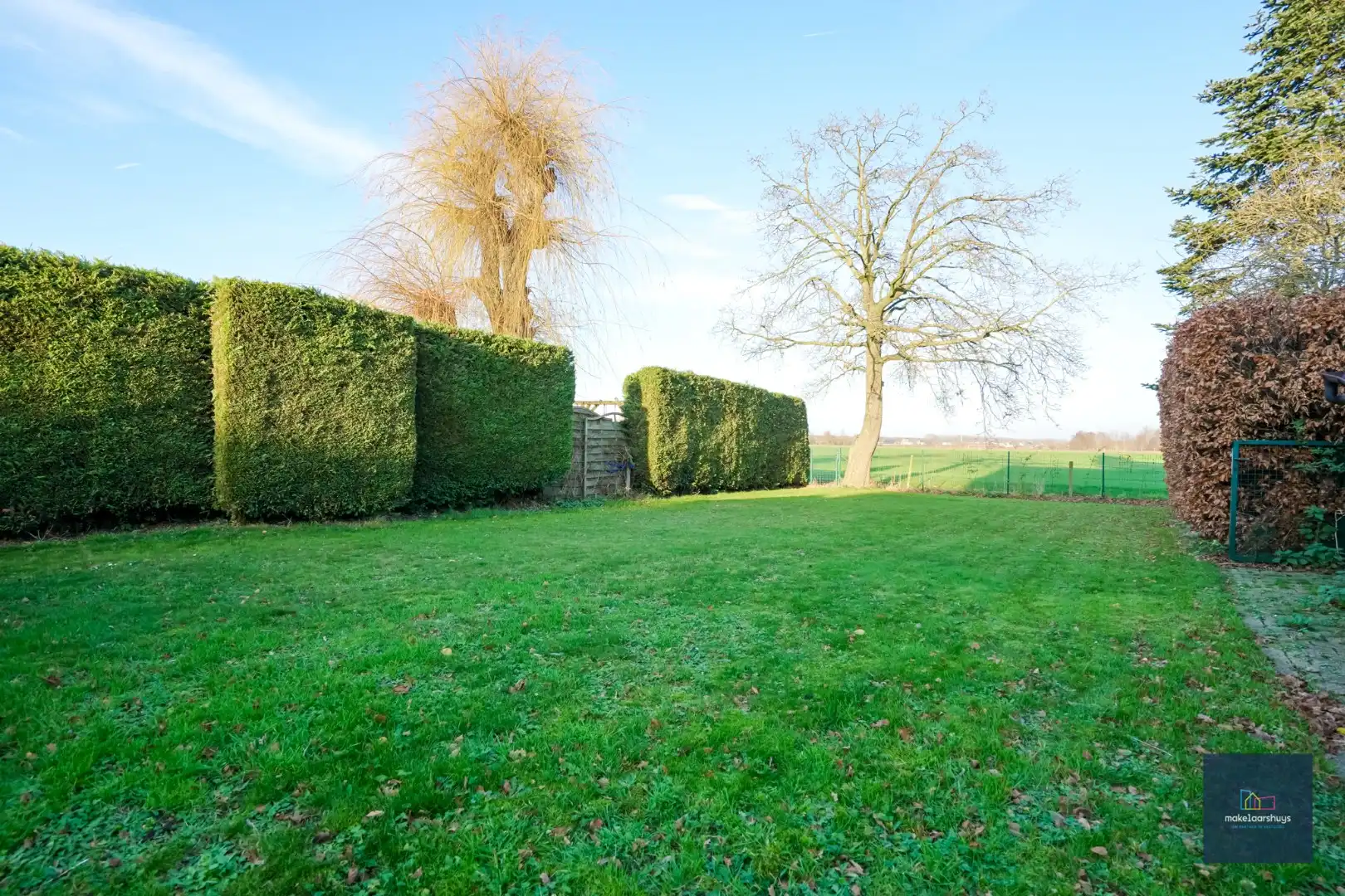 Ruime  halfopen bebouwing  met  zonnige tuin, terras en garage in Waarschoot  foto 4