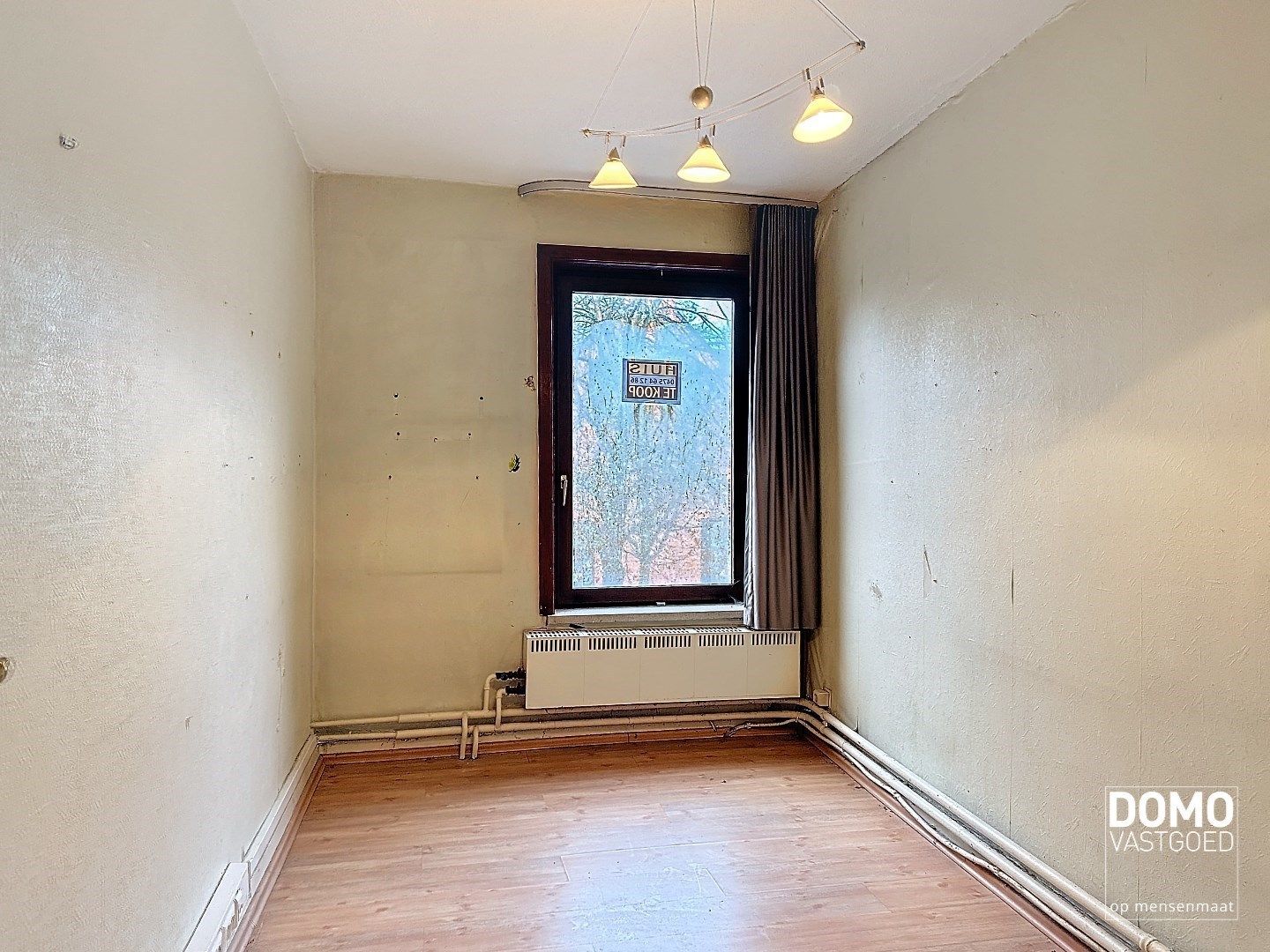 Te renoveren handelshuis gelegen in het centrum van Diepenbeek. foto 7