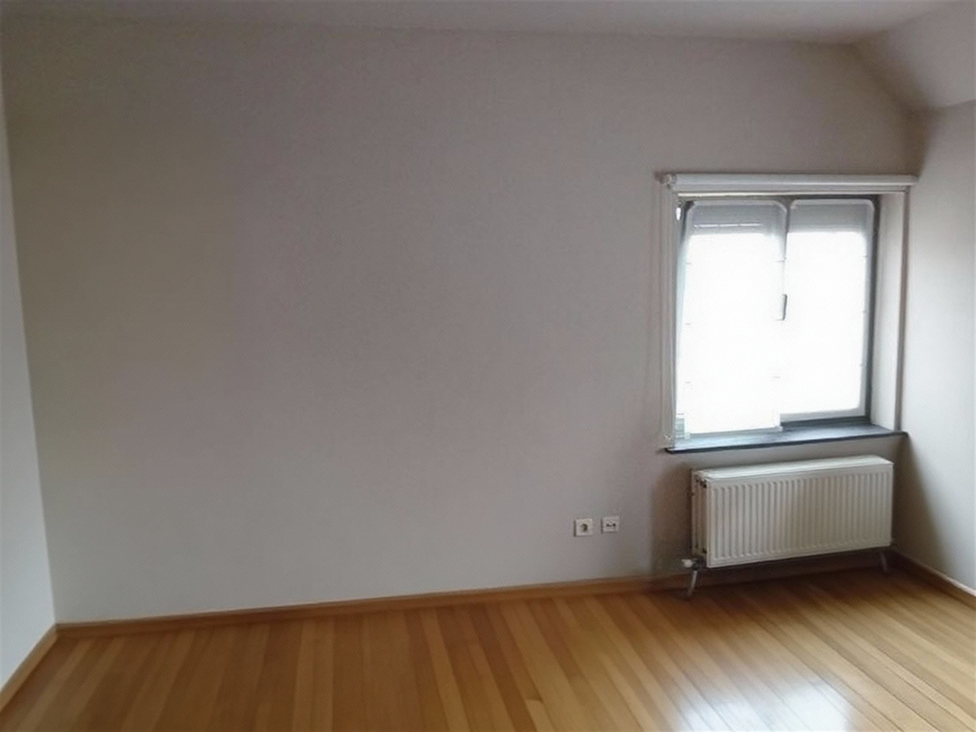 Rustig gelegen woning met 3 slaapkamers, garage en aangename tuin foto 8