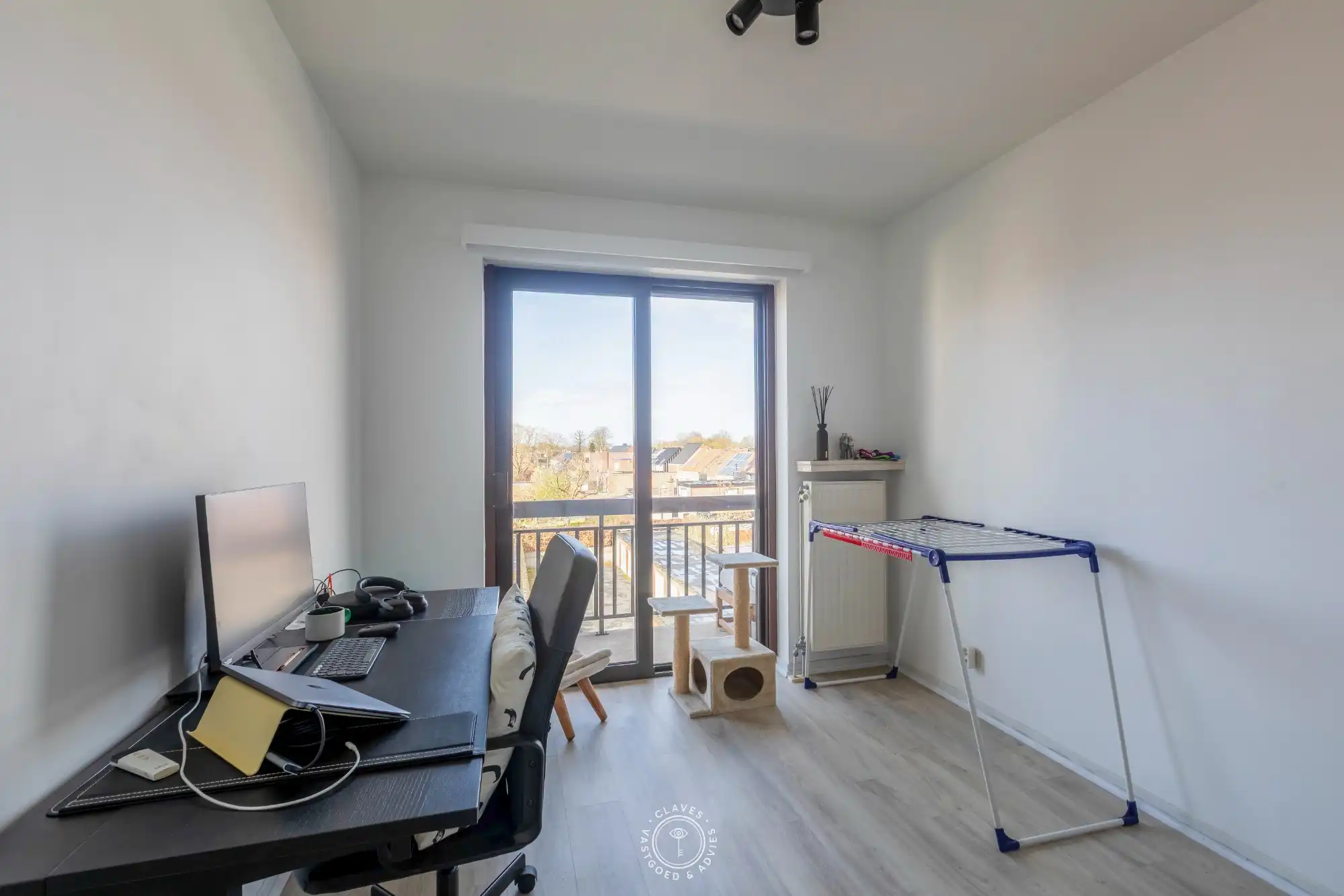 Gezellig 2 slaapkamer appartement met garagebox foto 15