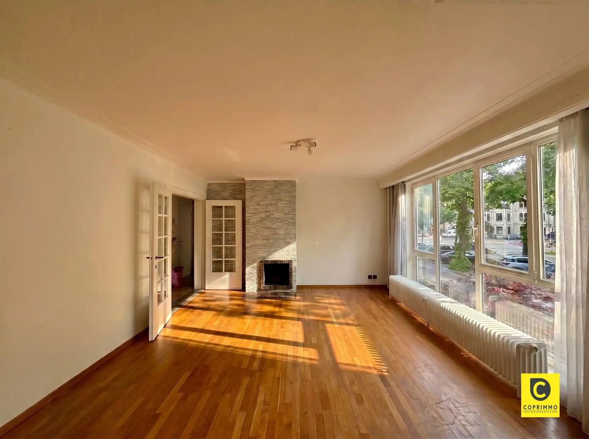 Instapklaar 3 slaapkamer appartement met zonnig terras, kelder en fietsenberging foto 3
