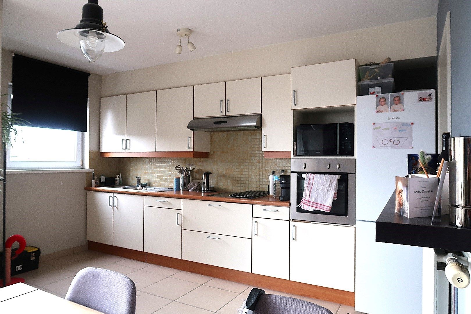 Opbrengsteigendom met 3 appartementen en 3 garageboxen. Ideale investering! foto 12