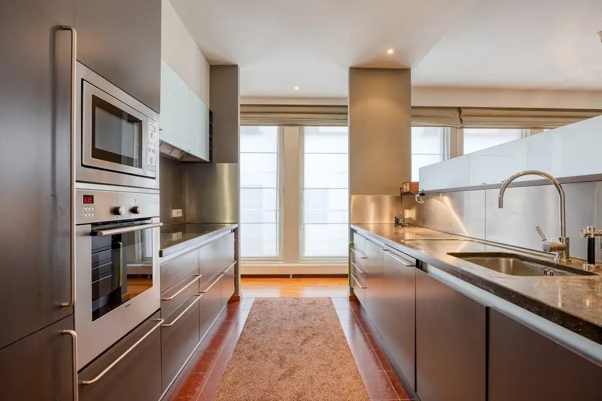 Exclusief stadsappartement met karakter en groot terras aan het Belfort. foto 11