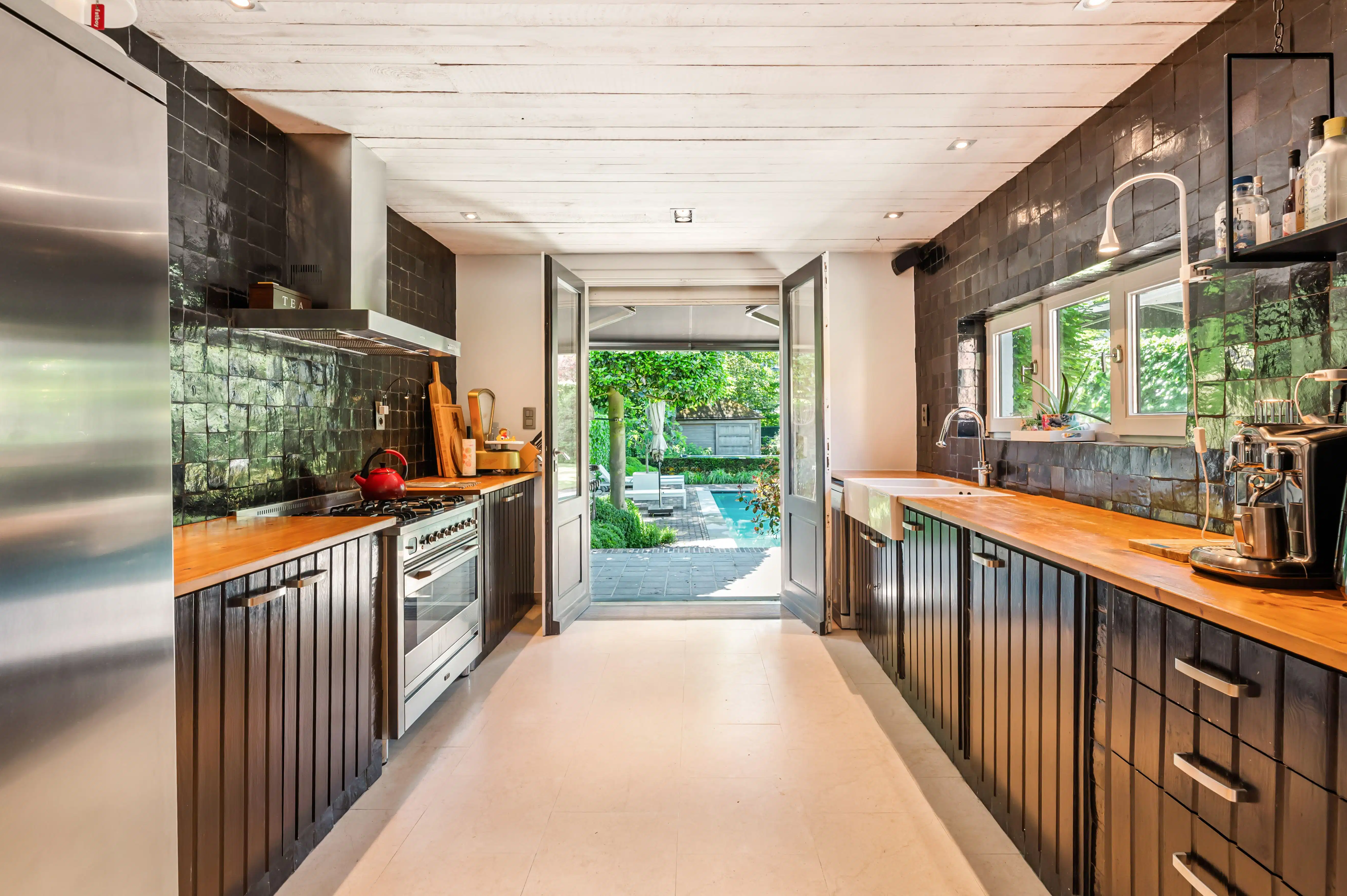 Karaktervolle herenwoning met verwarmd zwembad in hartje Kapellen. foto 17