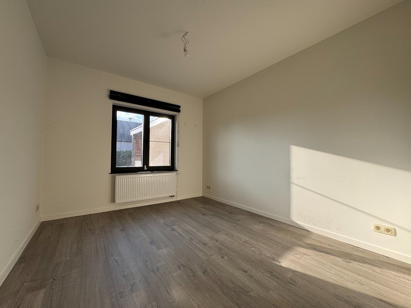 een instapklare 4-gevelwoning met tuin foto 9