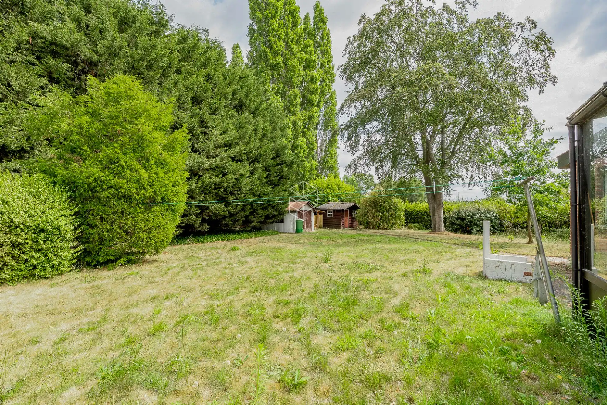Centraal gelegen gelijkvloerse woning met royale tuin op 1656m² foto 4