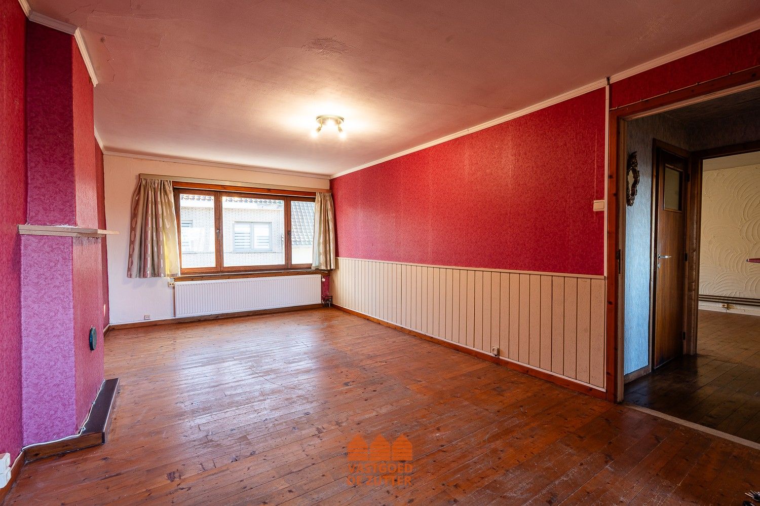Ruime woning met handelspand in het centrum van Boekhoute foto 5