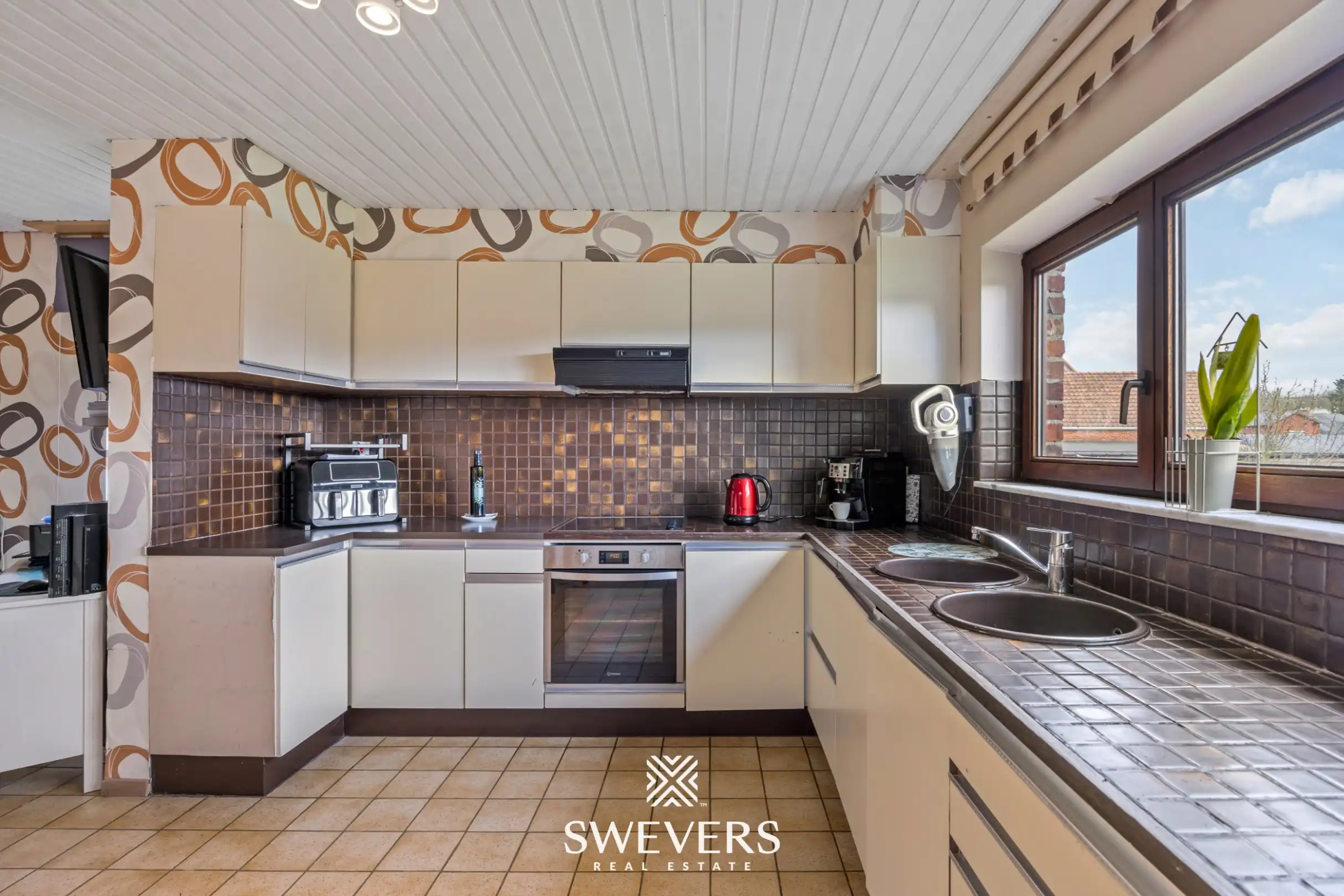 Zonnige woning met ruime zuid georiënteerde tuin in het rustige Diepenbeek foto 9