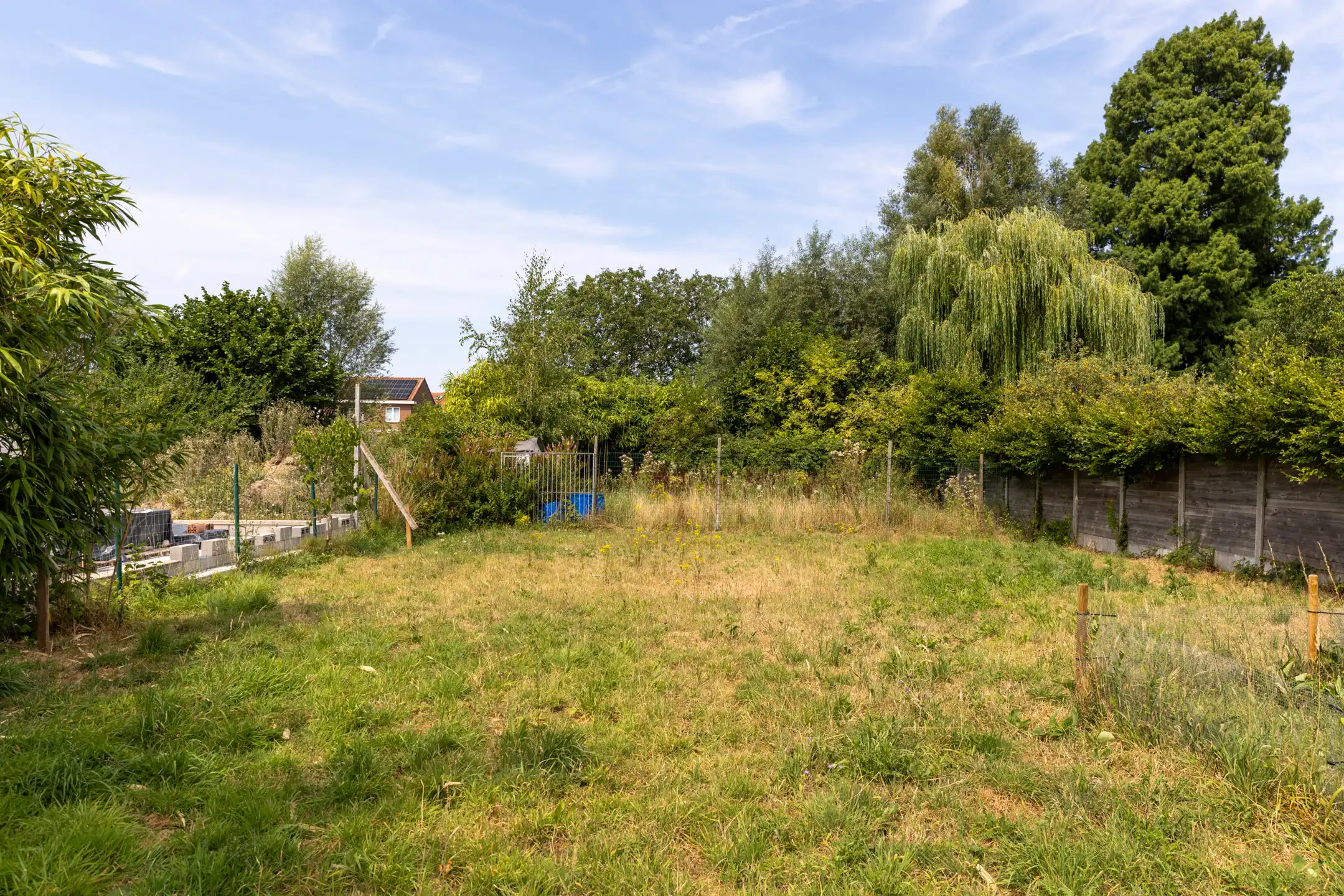 Te renoveren gesloten bebouwing met garage, ruime tuin en groenzicht in Oppuurs foto 22