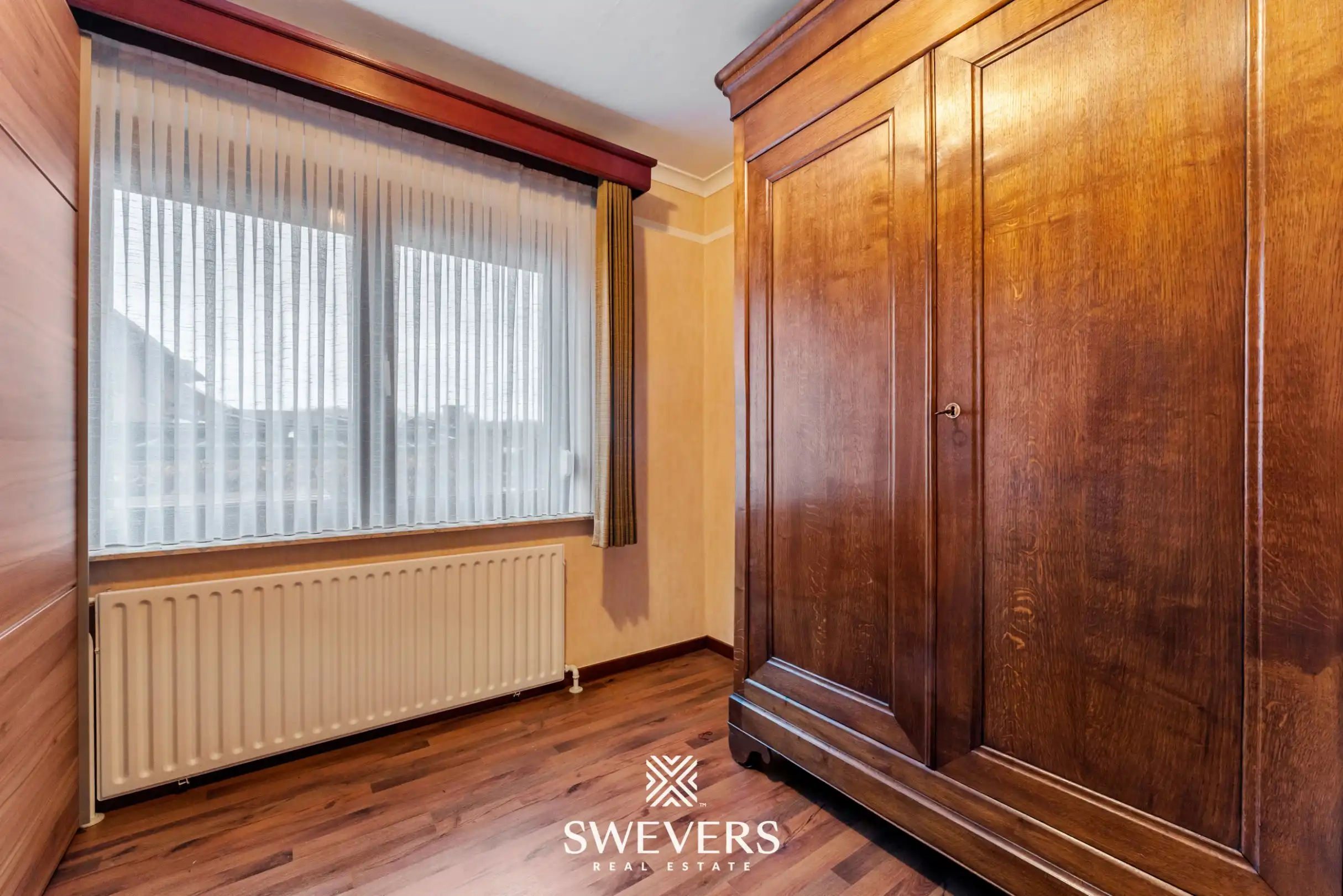 Open bebouwing met drie slaapkamers op uitzonderlijk groot perceel van 1.897 m² foto 20