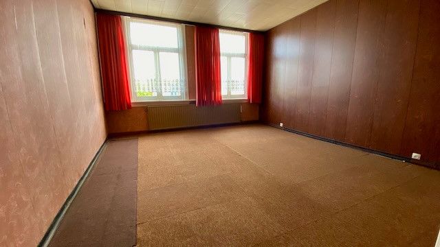 Knusse te renoveren rijwoning met 2 tot 3 slaapkamers en 2 terrassen. foto 11