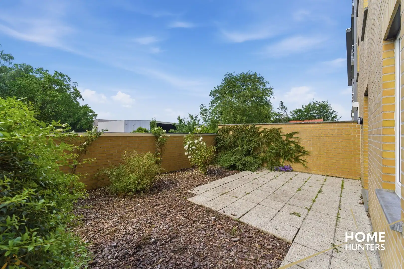 Instapklaar gelijkvloers appartement met 2 slaapkamers en ruime tuin foto 22