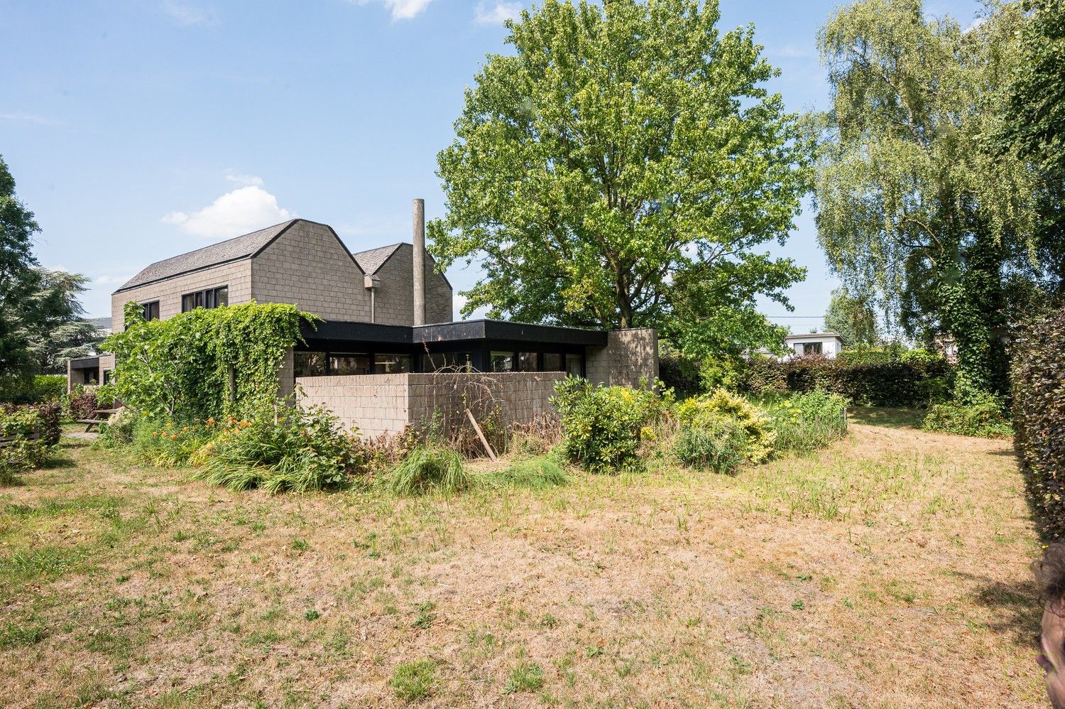Modernistische parel uit 1978 met brutalistische charme en praktijkruimte op riant perceel in Lembeke foto 32