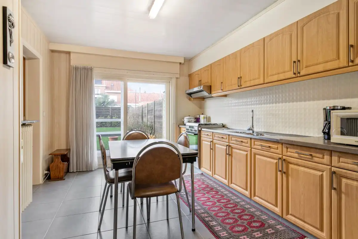 Zeer goed onderhouden halfopen bebouwing met 3 slaapkamers en garage! foto 7