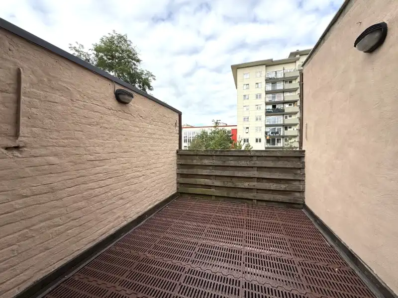 Lichtrijk duplexappartement met terras op wandelafstand van de Markt foto 2