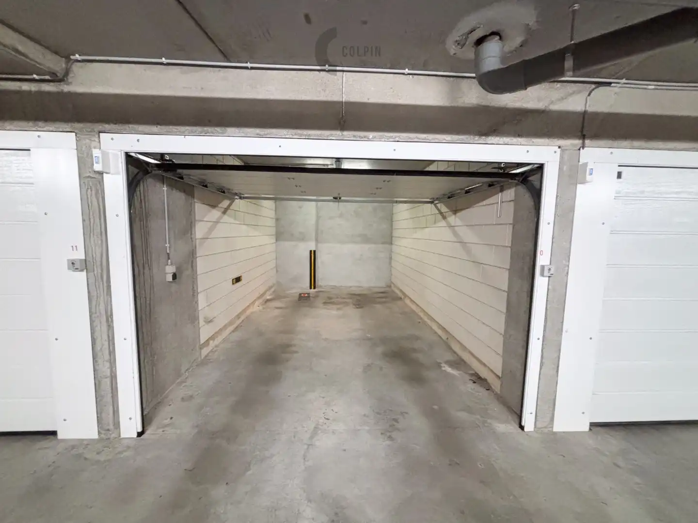 Garagebox in het centrum van Heist foto 2