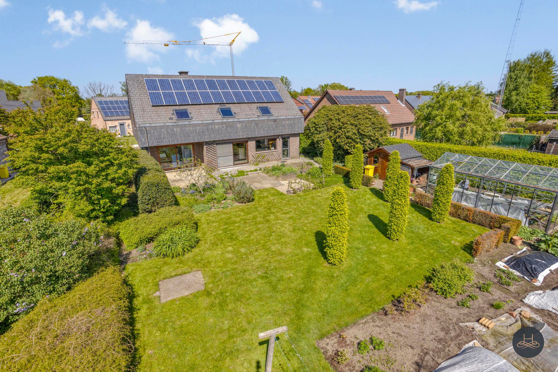Vrijstaande woning met prachtig aangelegde zuidgerichte tuin foto 28