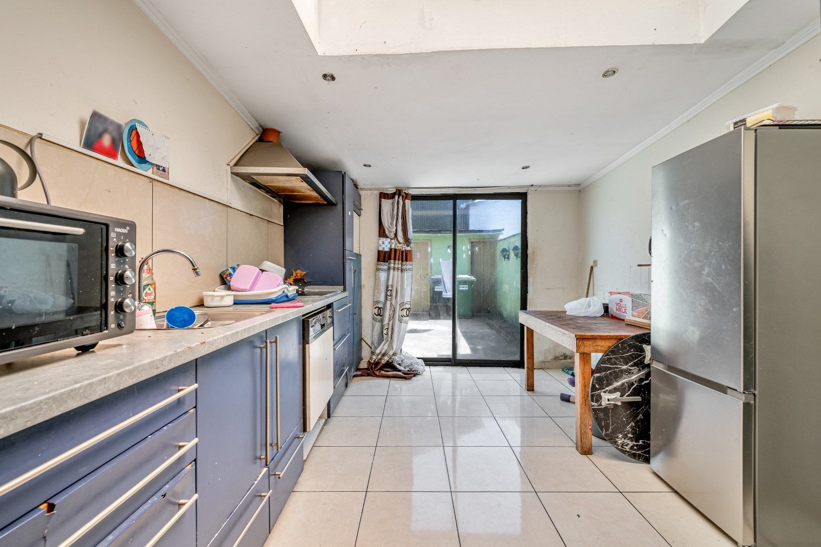 Te renoveren woning met stadskoer foto 5