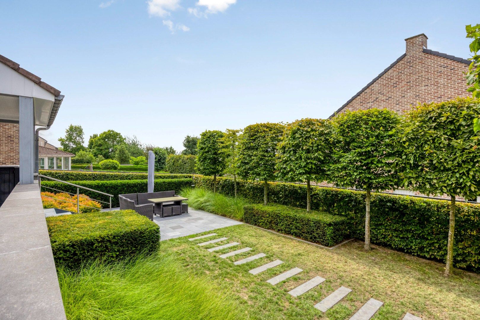 Ruime open bebouwing met zonnige tuin en mogelijkheid praktijkruimte foto 28