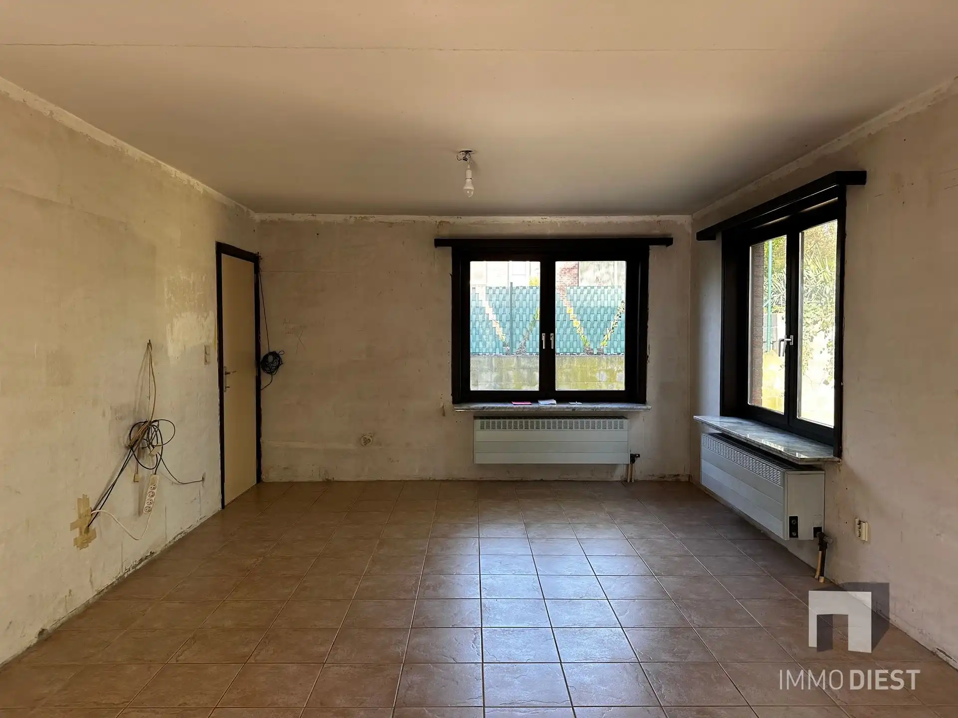 Te renoveren woning met 4 slaapkamers op Schellekensberg foto 4