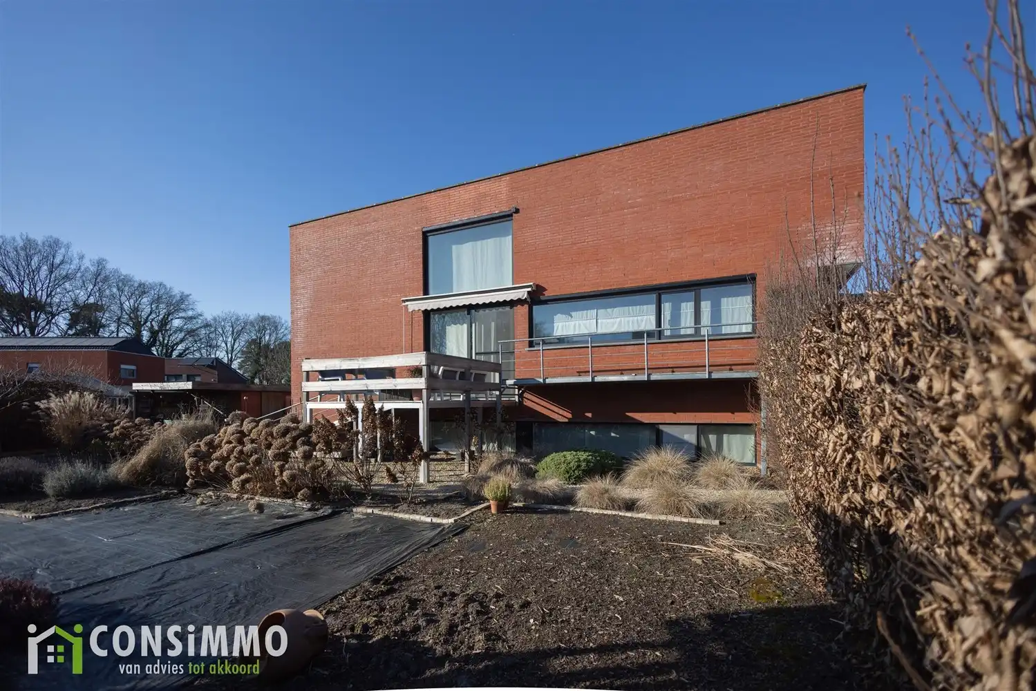 Unieke woning met industrieel-landelijke stijl in een rustige woonwijk van Genk foto 29