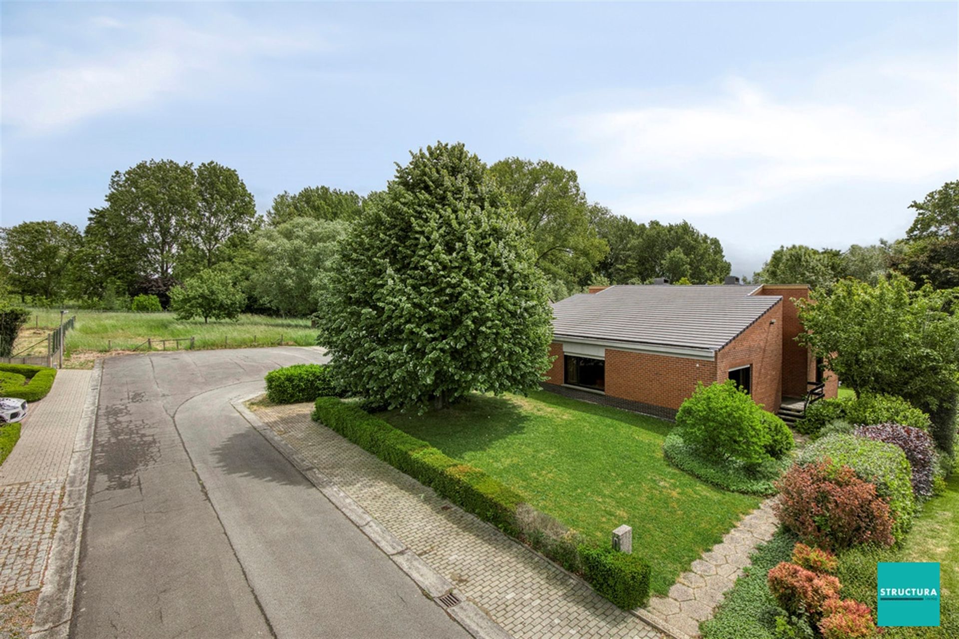 Hoofdfoto van de publicatie: Villa op rustige TOP-locatie omgeven door groen!