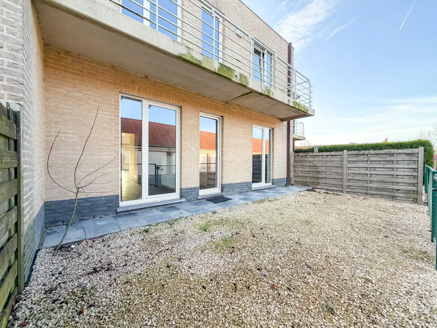 Lichtrijk gelijkvloers appartement met 2 slpk, garage en autostandplaats foto 23