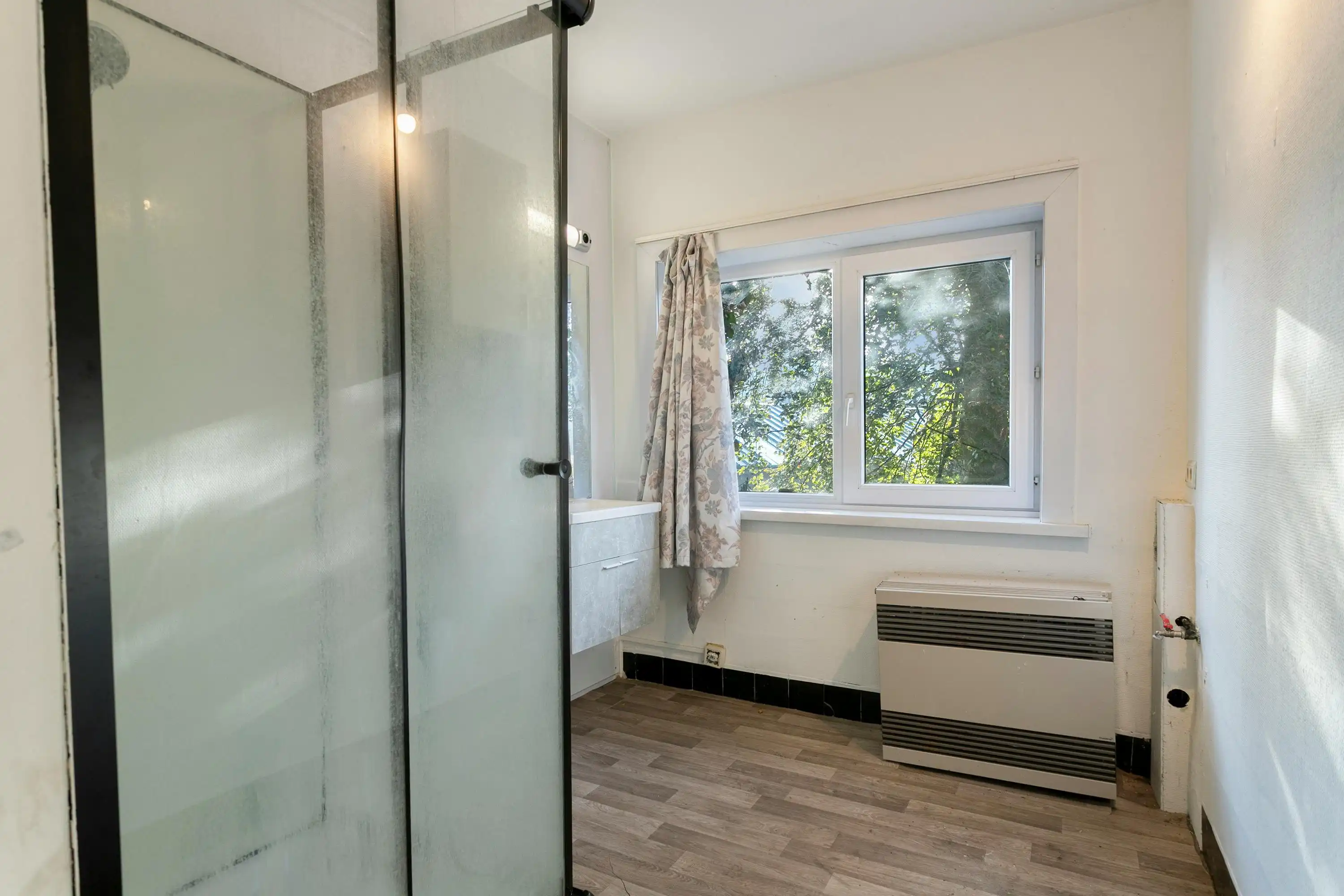 Karaktervolle woning met tuin en garage in centrum Roeselare foto 11