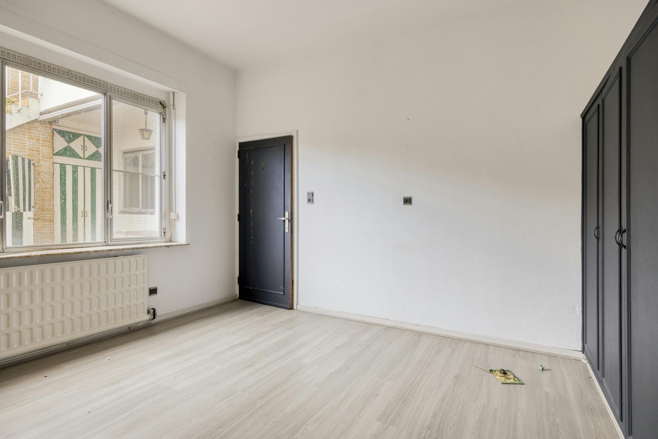 Te renoveren opbrengsteigendom met 3 appartementen en handelspand in Antwerpen foto 49