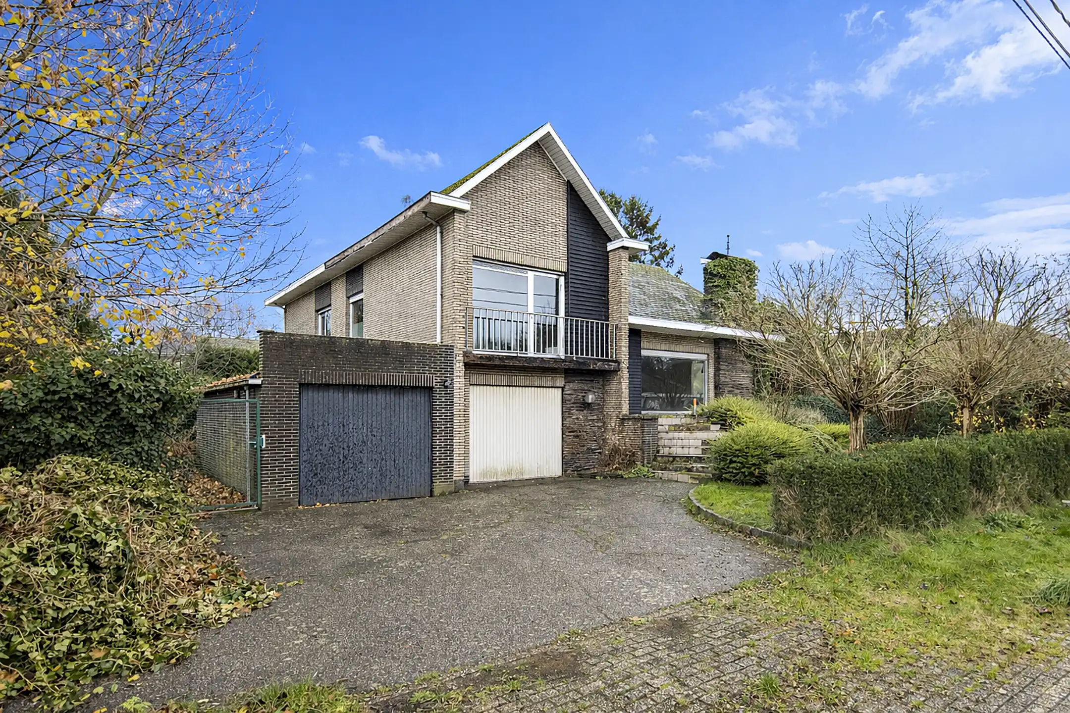 Te renoveren splitlevelwoning op perceel van 1.360 m² in Malle foto 2