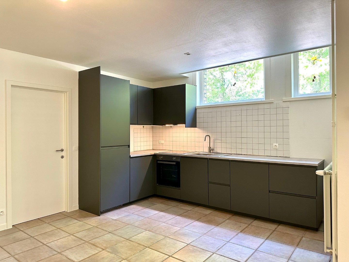 Gerenoveerd gelijkvloers appartement foto 3