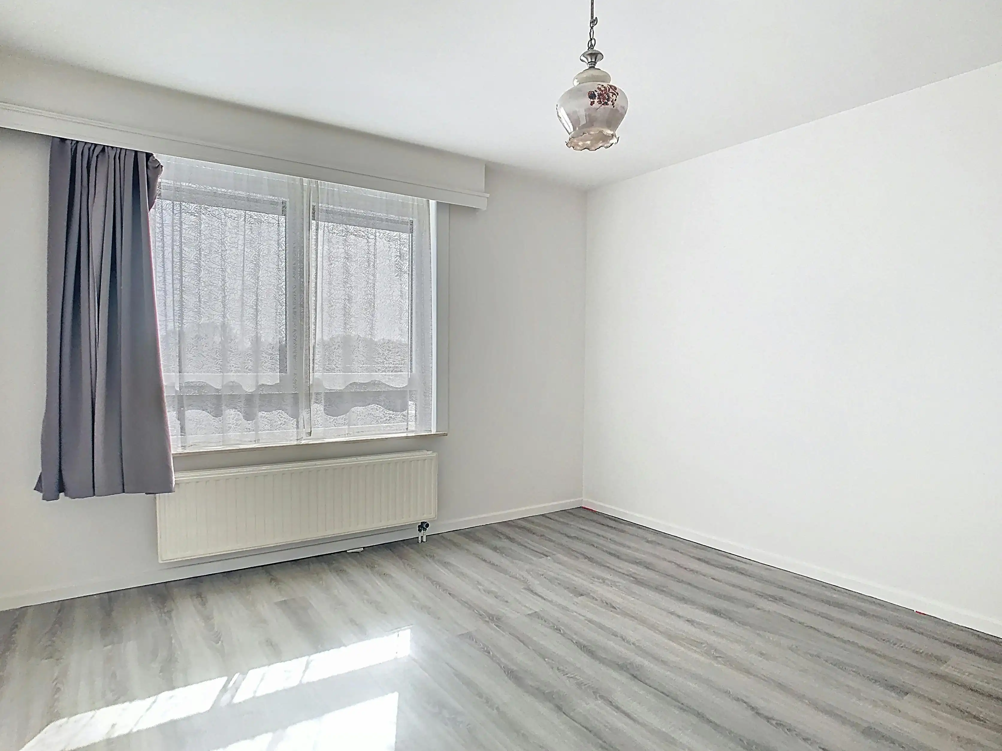 Gemoderniseerd appartement met 2 slpkmrs (garage mogelijk) foto 9